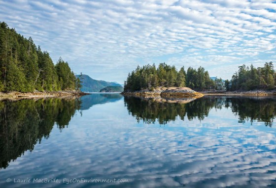 Islands and clouds reflected in the water